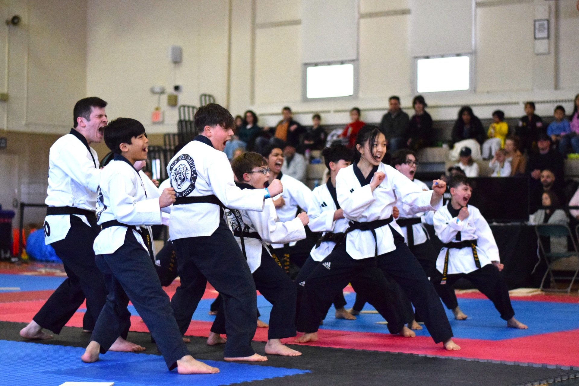 Black belt team demo at tournament